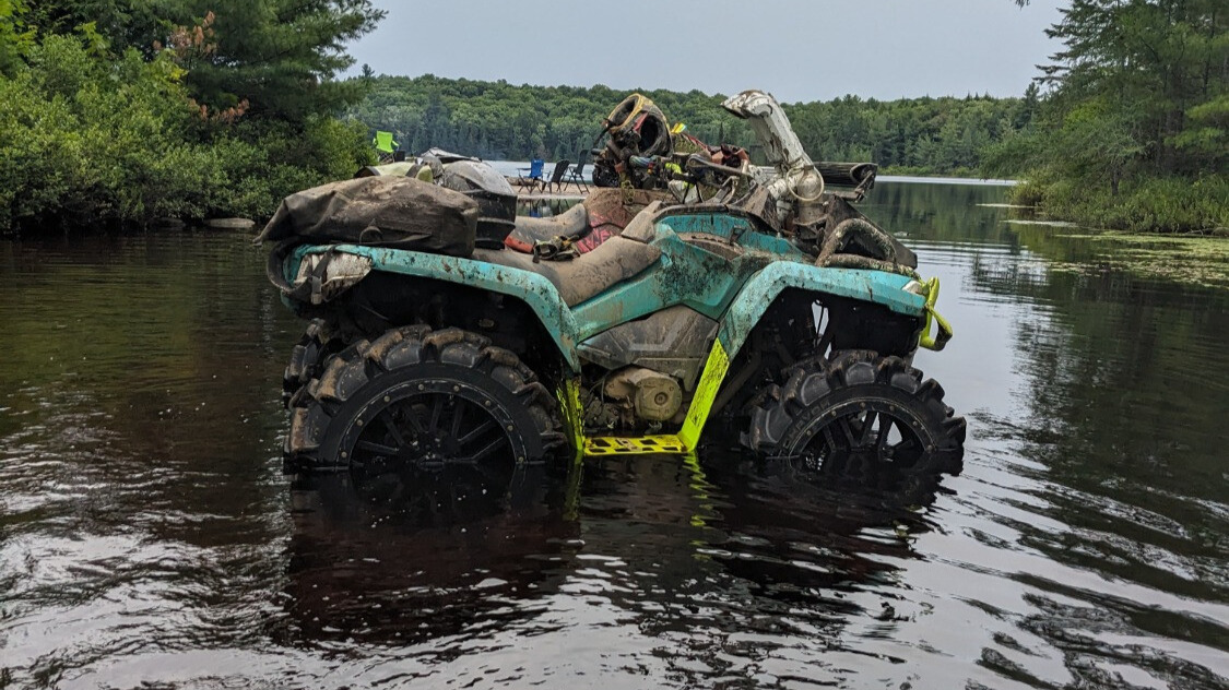 elka suspension kit on atv in river