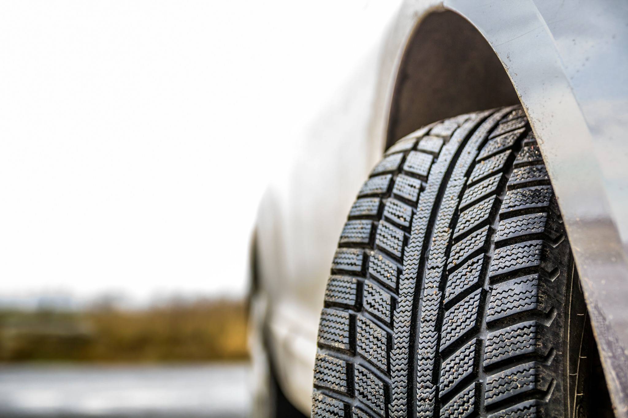 new all-season tire on car