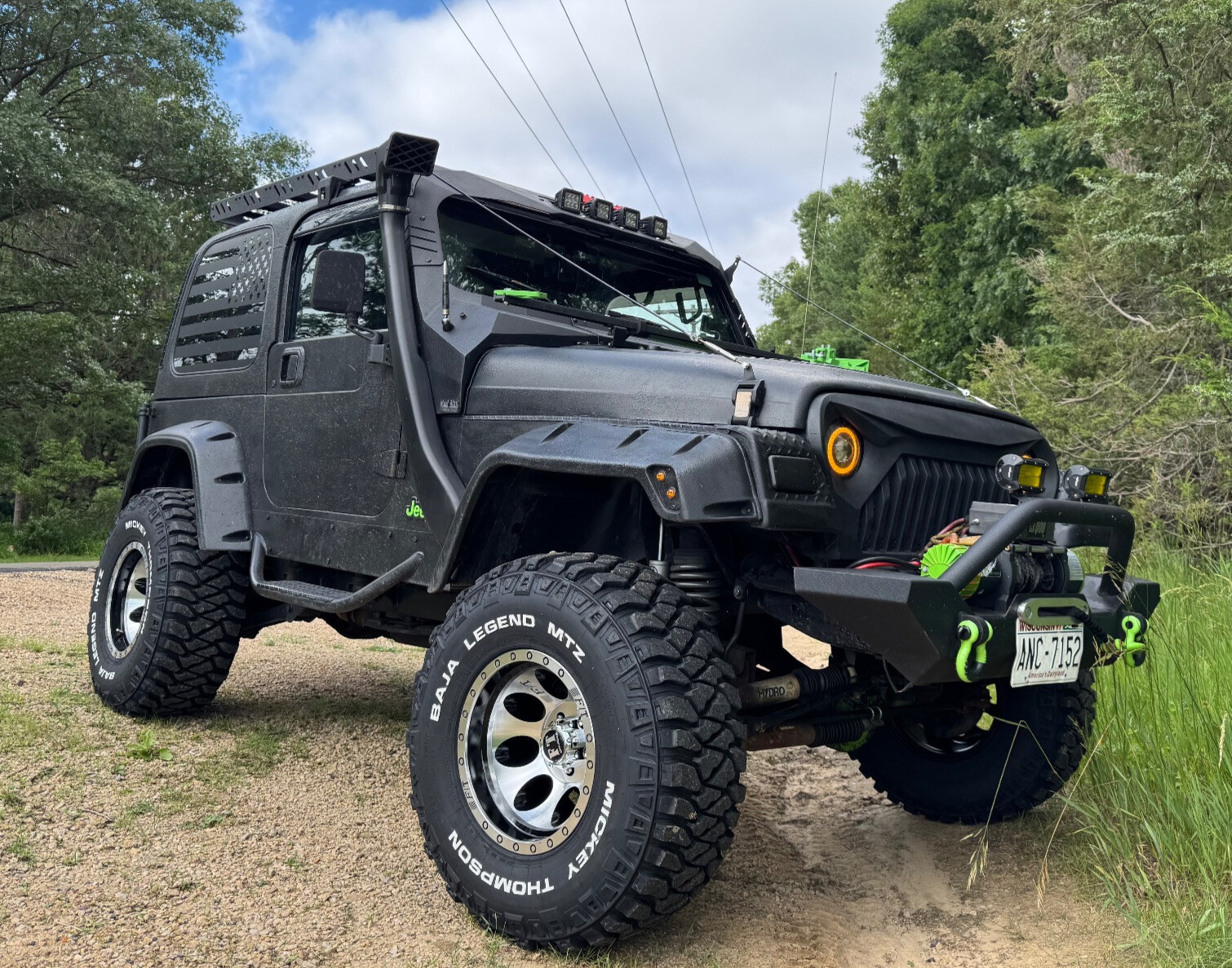 1997 Jeep Wrangler Sport with Full Throttle FT-5096 wheels and Rough Country Suspension Lift