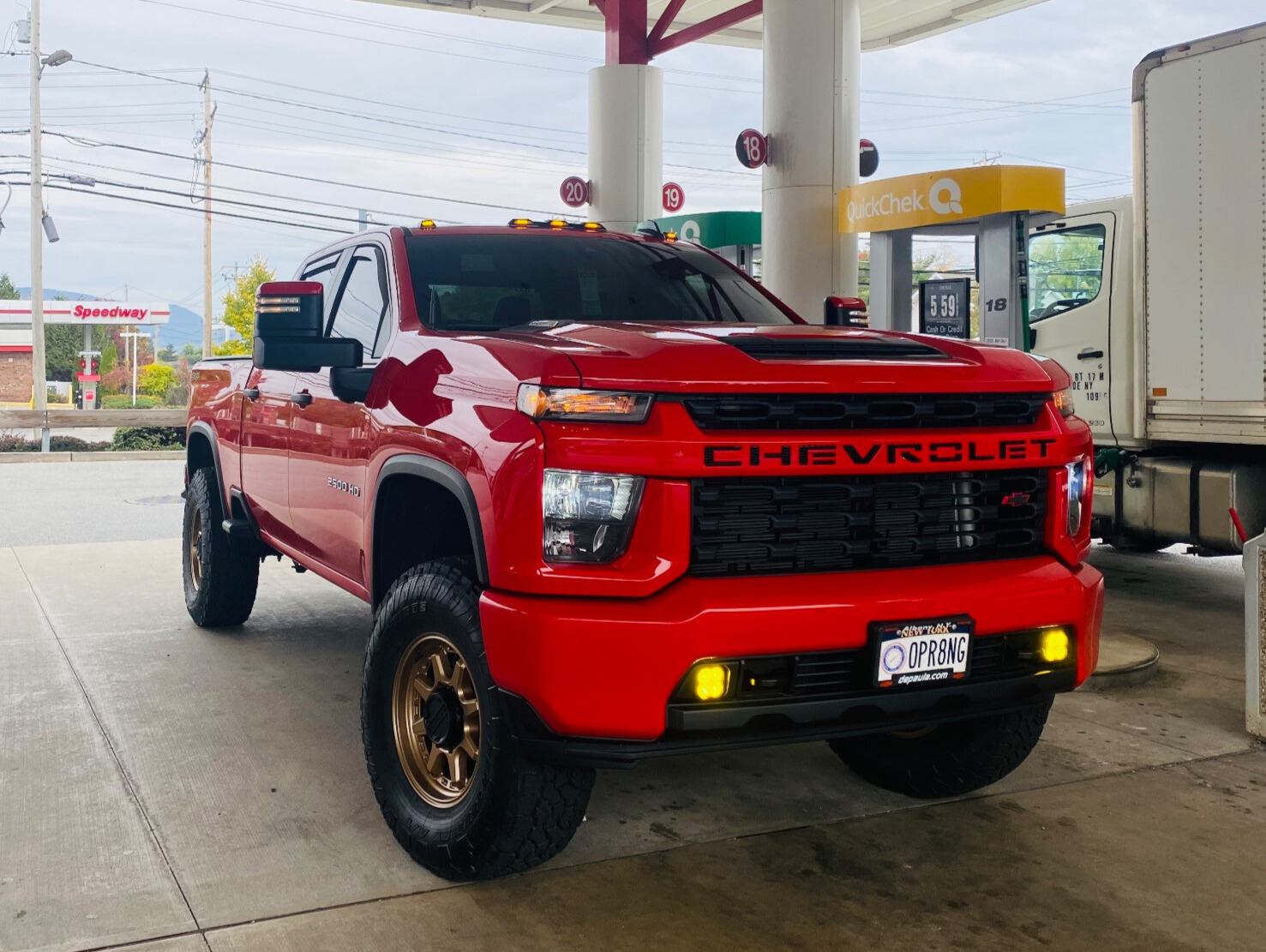 2022 Chevy Silverado 2500 HD with Raceline Scout wheels and Toyo Open Country A/T III tires