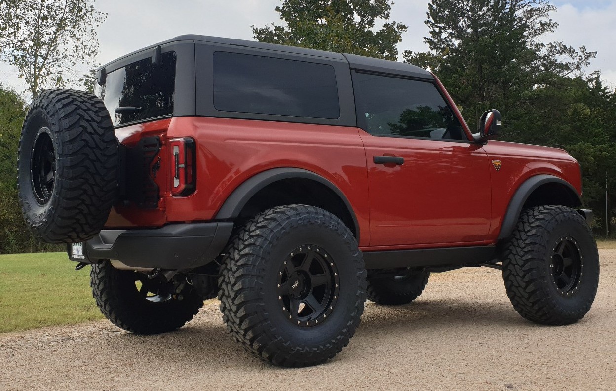 profile view of red ford bronco