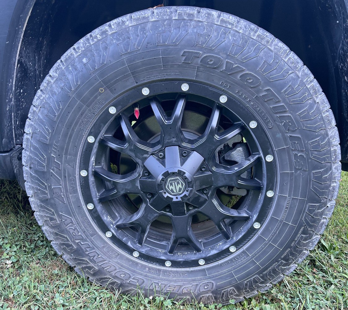 isolated view of jeep cherokee wheel