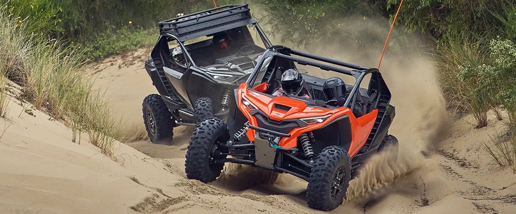 two zforce machines on dirt road