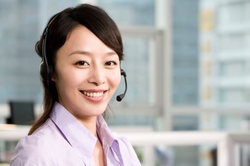 A woman wearing a headset