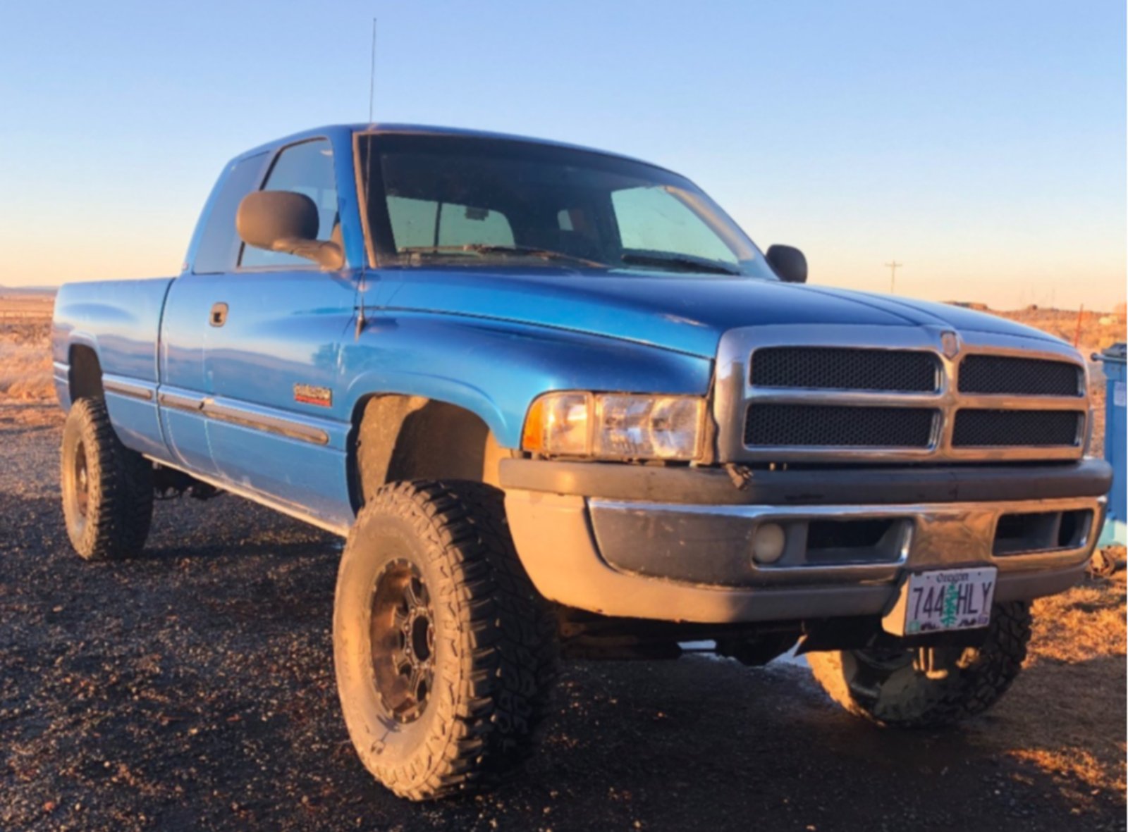1999 Dodge Ram 2500 with Raceline Assault wheels and Mastercraft Courser MXT tires