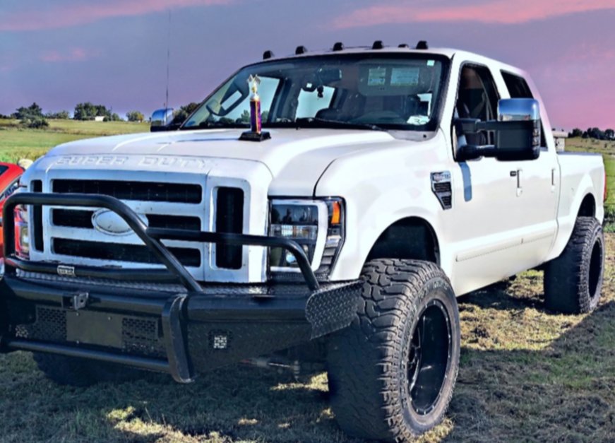 2009 Ford F-250 with Radar Renegade R7 tires and Rough Country Leveling Kit