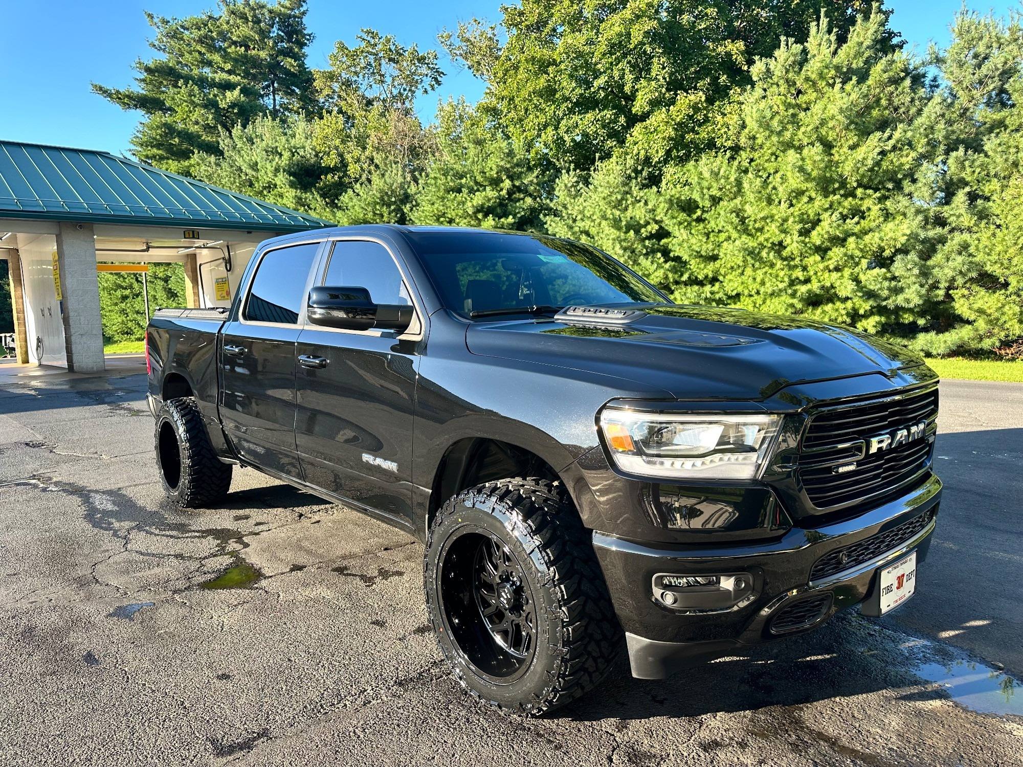 Leveled 5th gen Ram 1500 on 20x12 -44 wheels with 33x12.50 tires