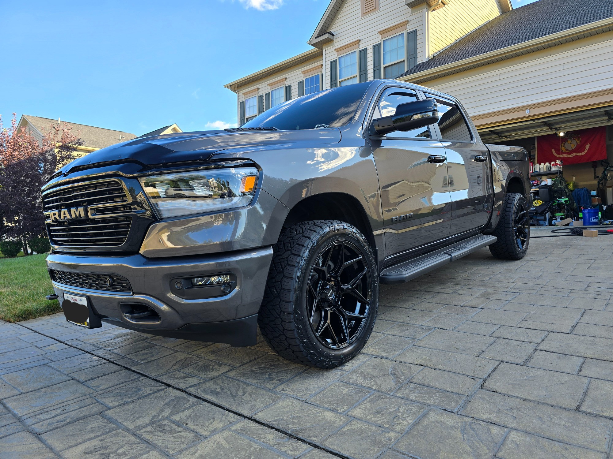 Leveled 2024 Ram 1500 Laramie on aftermarket wheels and tires