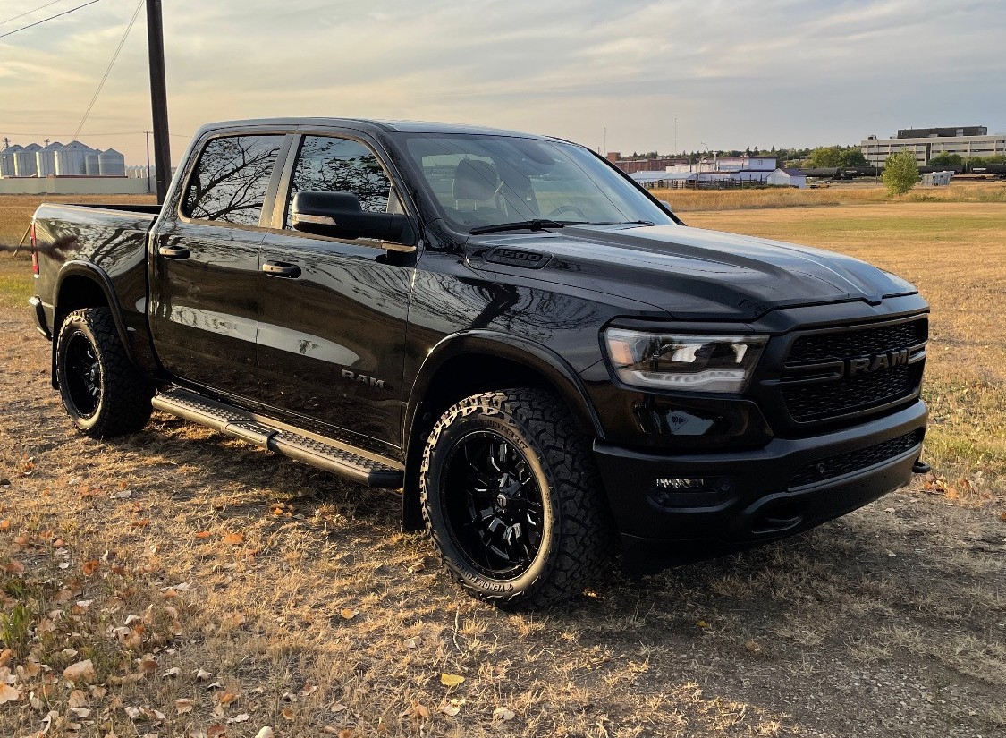 Stock height 5th gen Ram 1500 on 20x10 -18 wheels with 33x12.50 tires