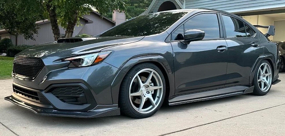 front view of lowered car in driveway