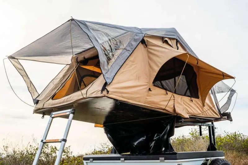opened rooftop tent on off-road rig