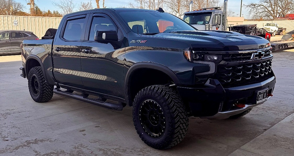 Side view of chevrolet silverado with new tires