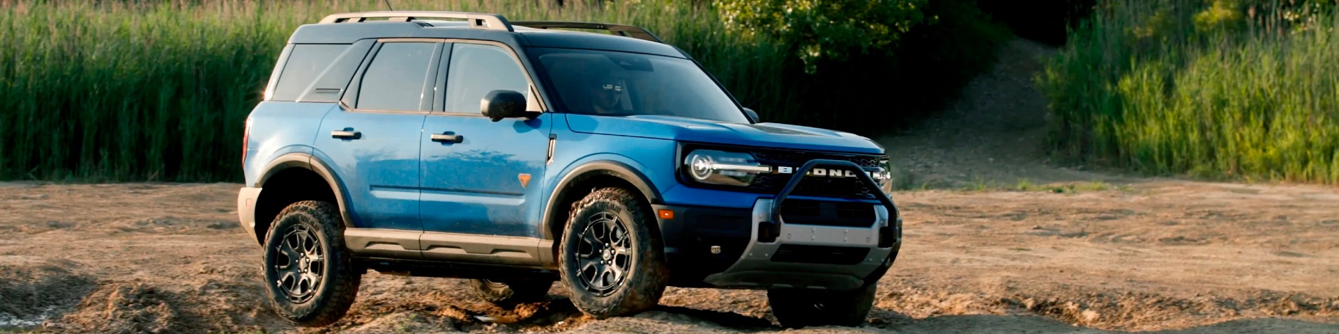 front view of blue ford bronco sport sasquatch on trail