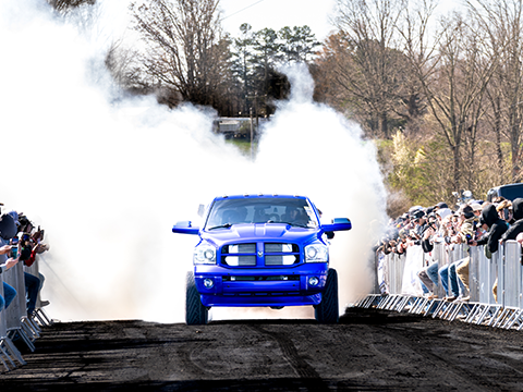 Blue Ram pickup truck in the burnout alley of FP 5.0 in Jamestown, TN