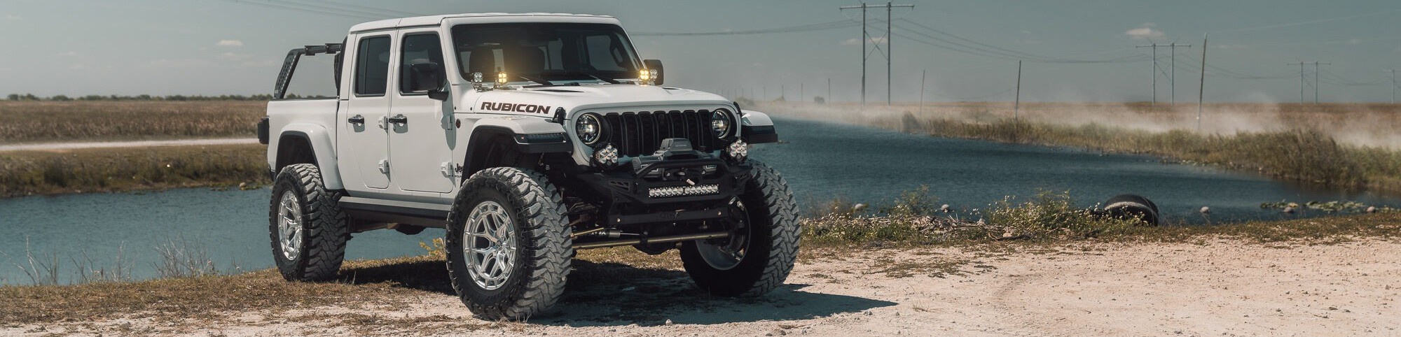wrangler rubicon in front of water