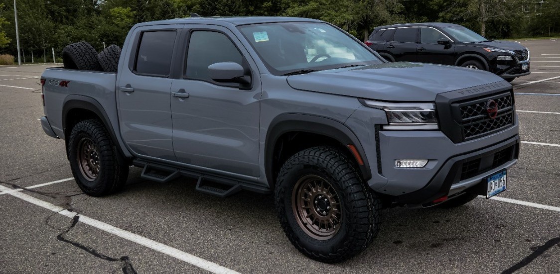 Front view of silver nissan frontier pro 4x