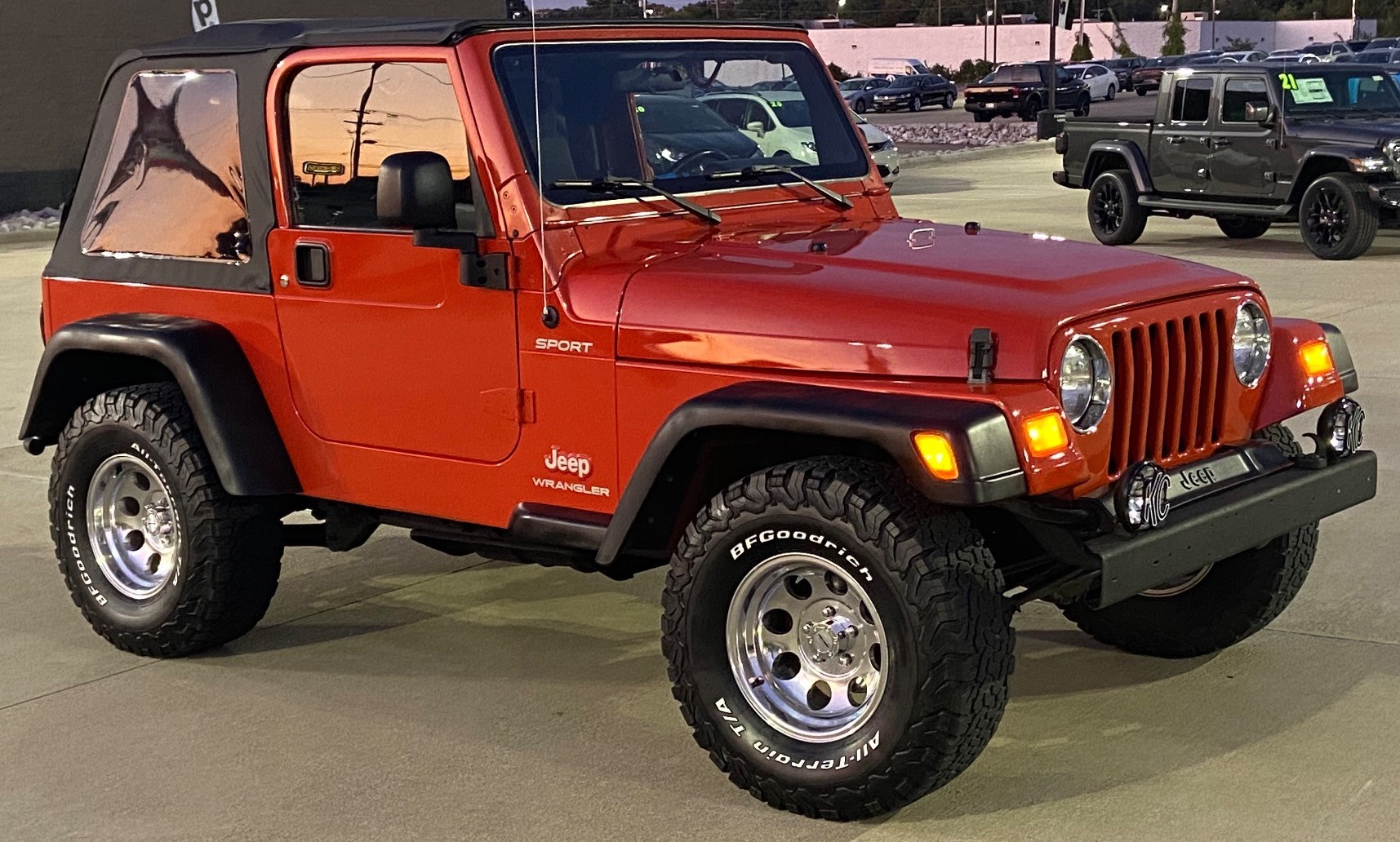 front view of red jeep wrangler tj