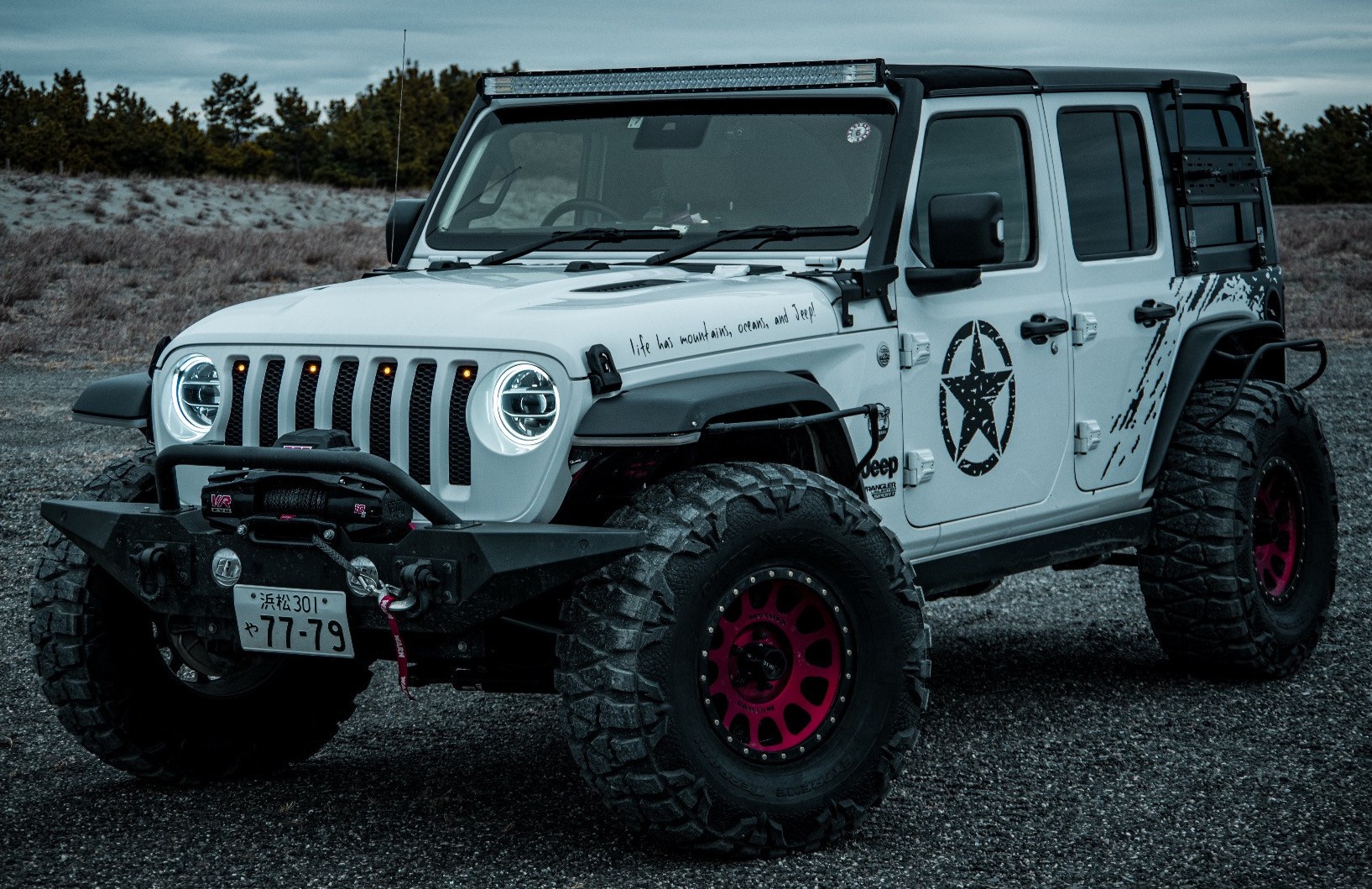 front view of white jeep wrangler